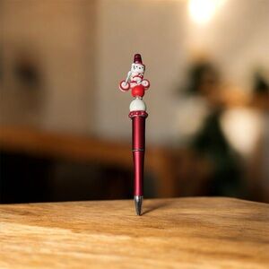Sold Red Character on bike Pen